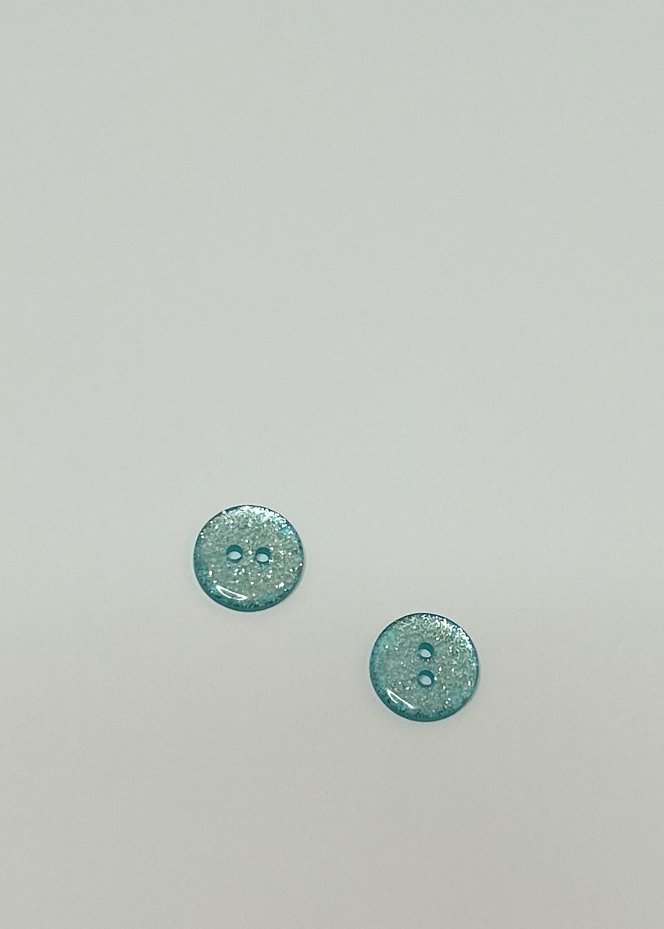 Round glitter buttons