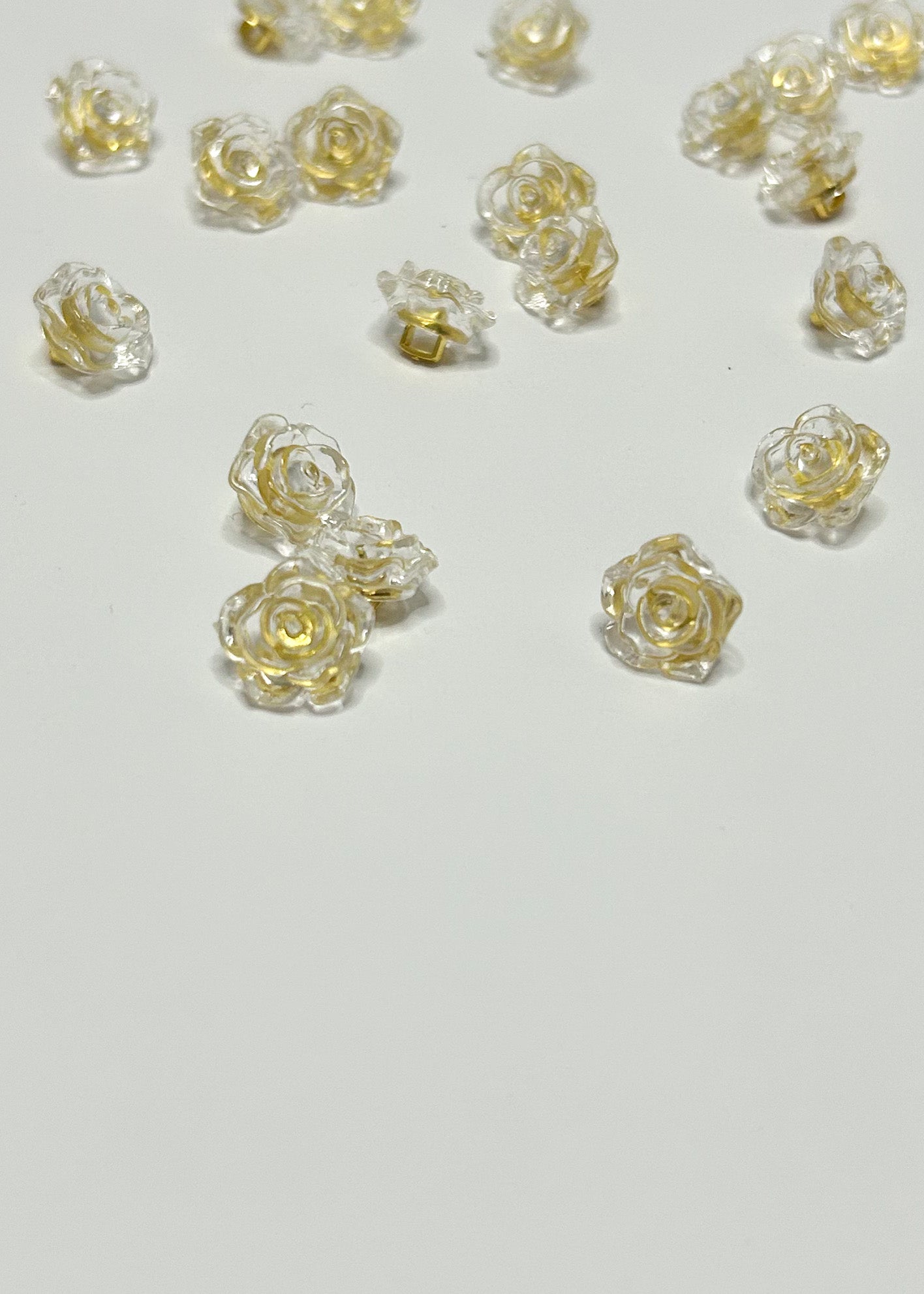 Clear rose buttons